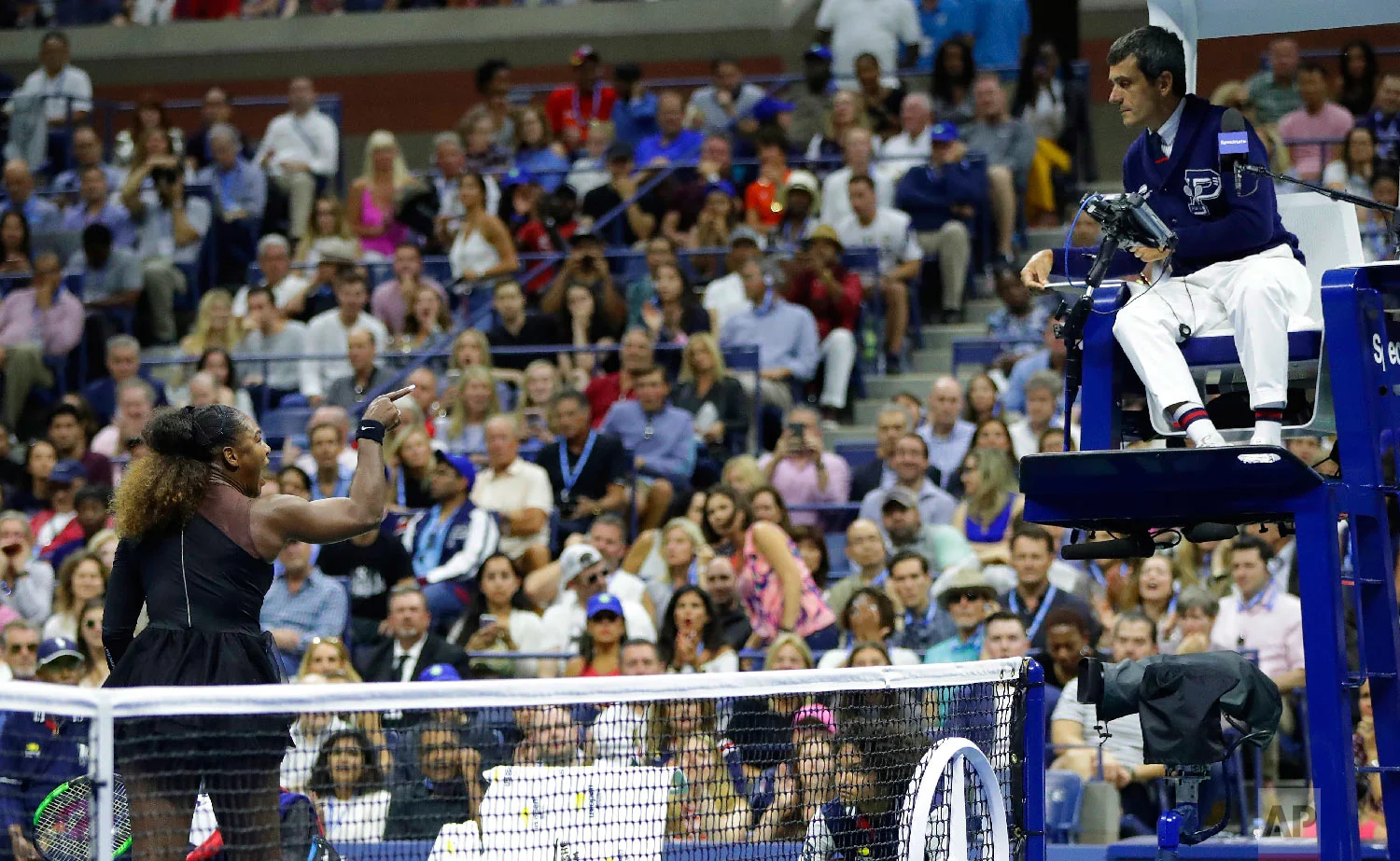 Serena Williams argues with chair umpire Carlos Ramos during a match against Naomi Osaka, of Japan, in the women's final of the U.S. Open tennis tournament on Sept. 8, 2018, in New York. (AP Photo/Julio Cortez)