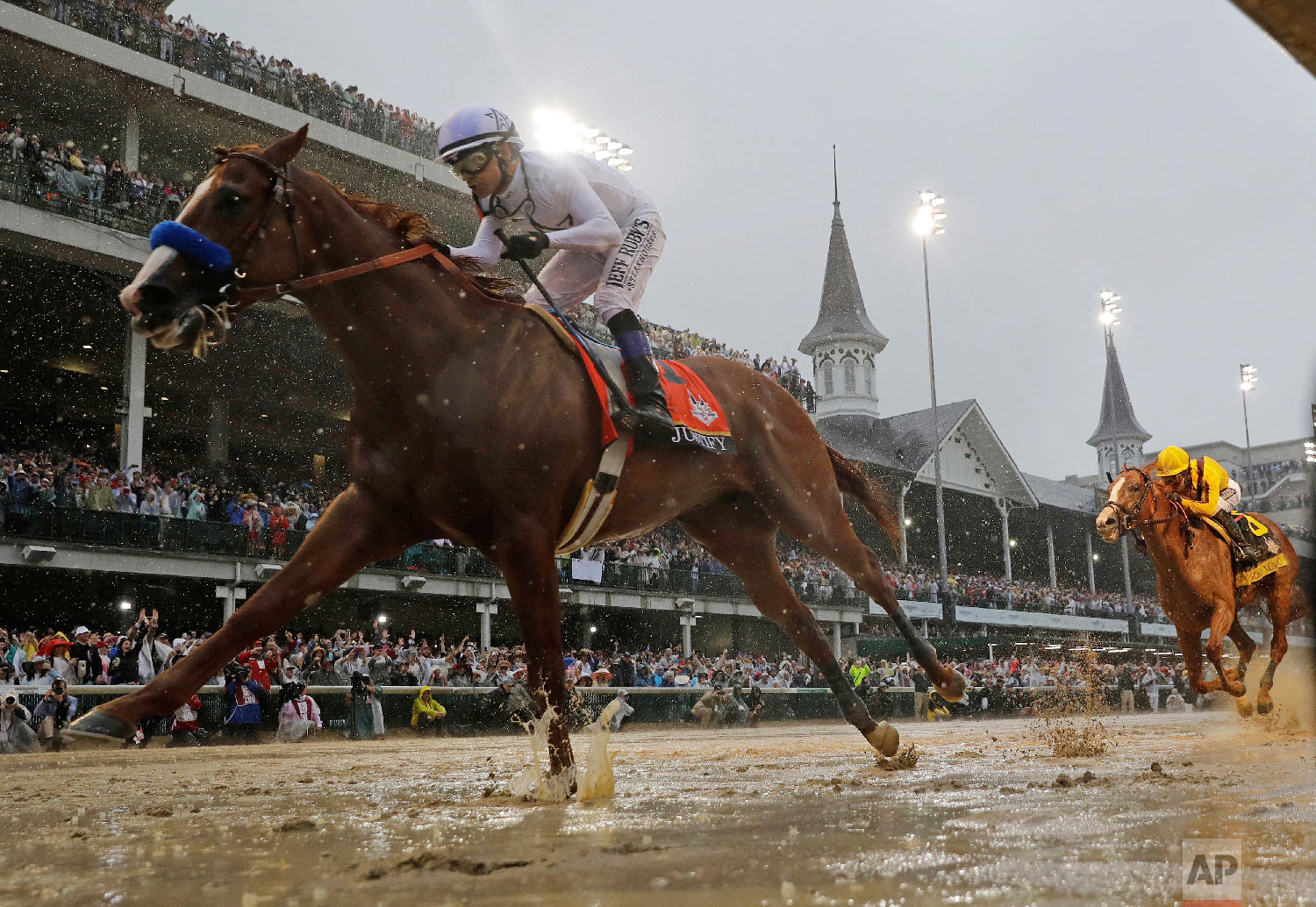  Mike Smith rides Justify to victory during the 144th running of the Kentucky Derby horse race at Churchill Downs on May 5, 2018, in Louisville, Ky. (AP Photo/Morry Gash) 