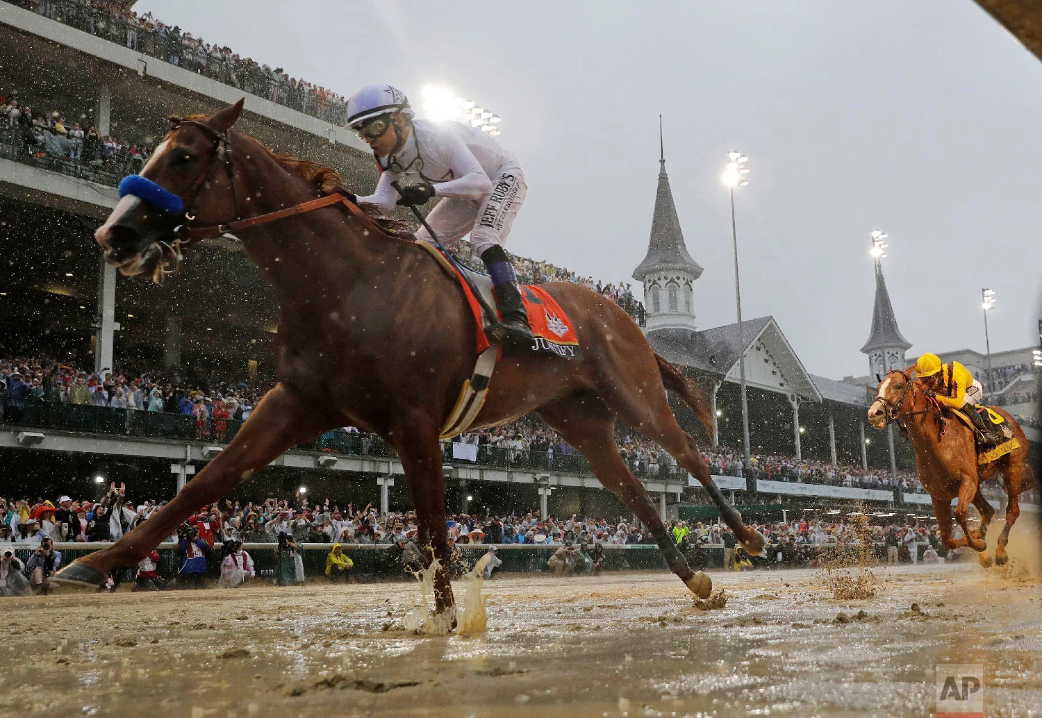 Mike Smith rides Justify to victory during the 144th running of the Kentucky Derby horse race at Churchill Downs on May 5, 2018, in Louisville, Ky. (AP Photo/Morry Gash)