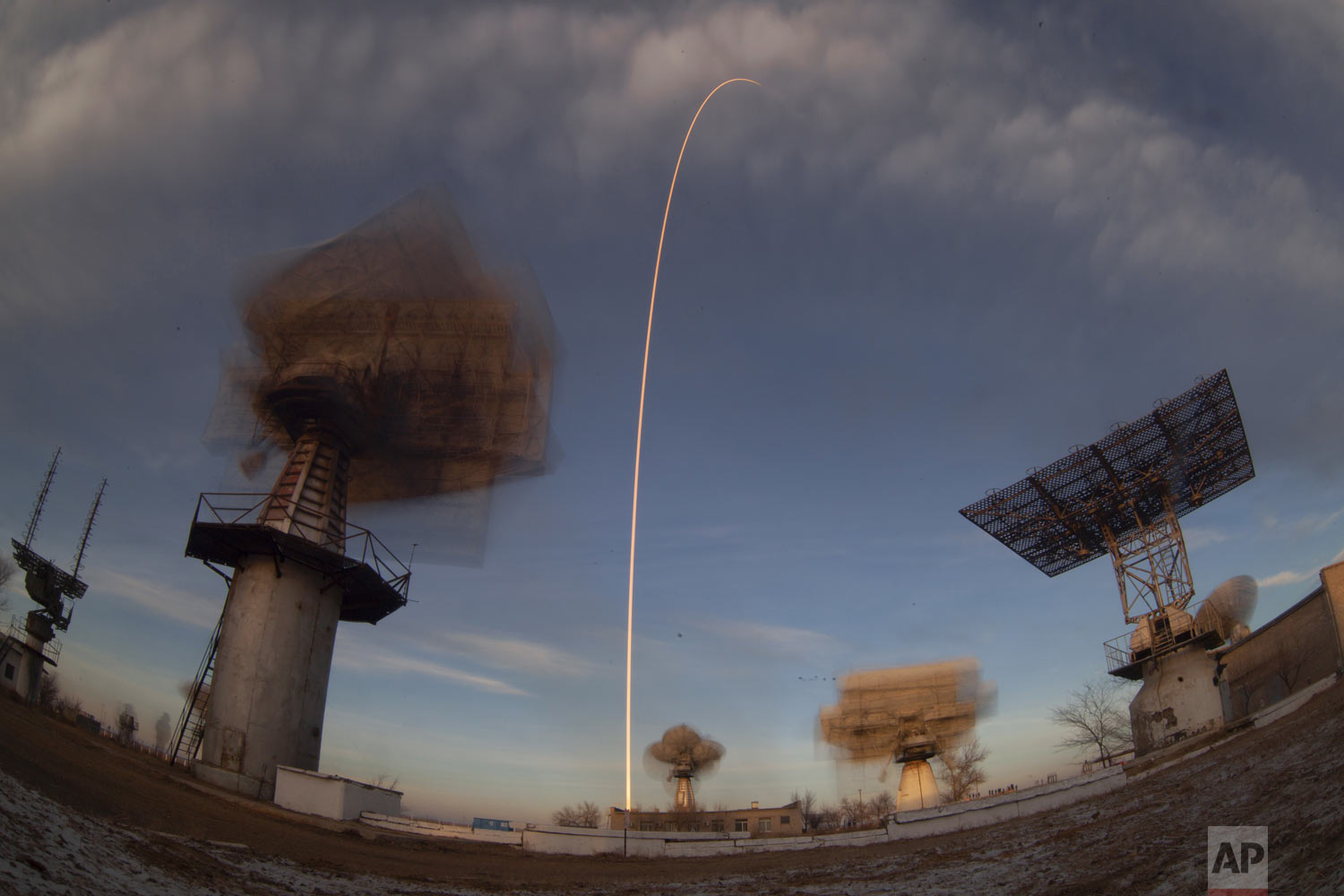  In this photo taken with a long exposure, a Soyuz rocket carrying a new crew to the International Space Station blasts off from the Russian-leased Baikonur cosmodrome in Kazakhstan, Monday, Dec. 3, 2018. The Russian rocket carries U.S. astronaut Ann