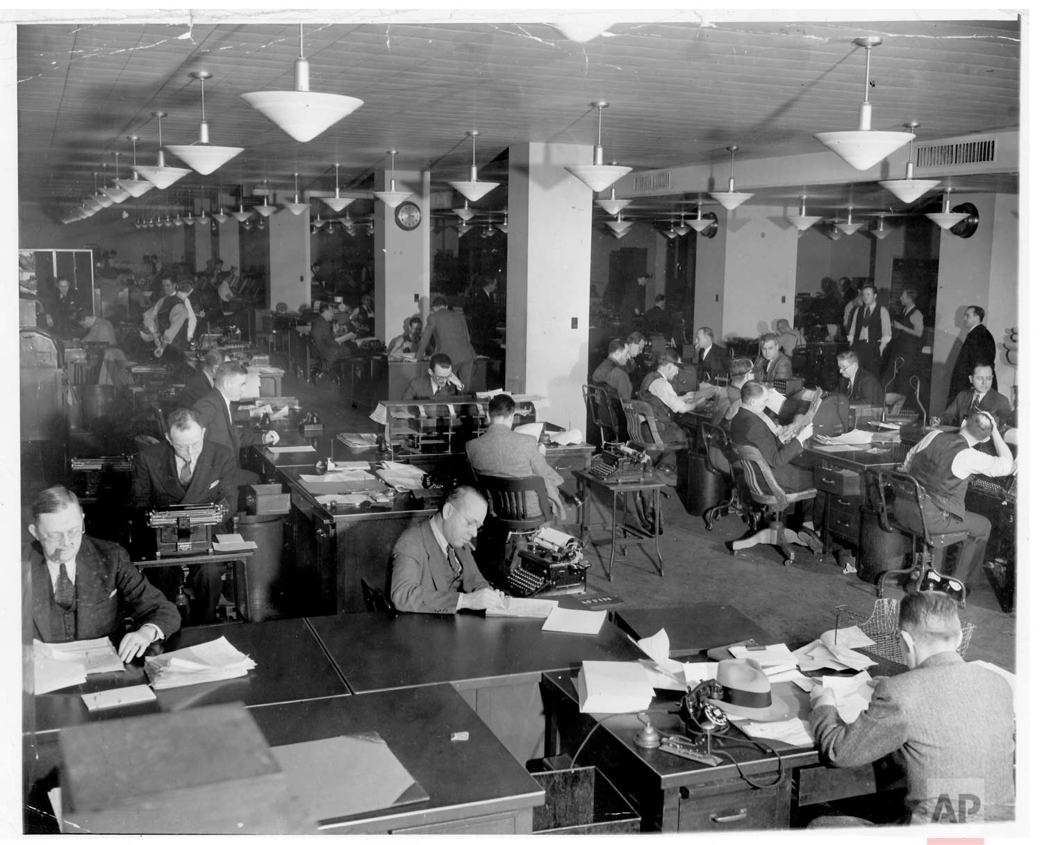  The newsroom at Associated Press headquarters at 50 Rockefeller Plaza, 1939. (AP Photo/Corporate Archives) 