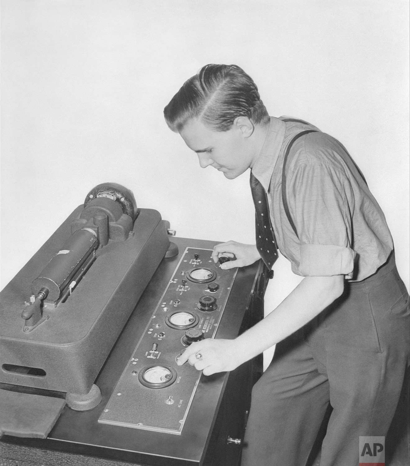  A wirephoto operator for the Associated Press is shown lining up the wirephoto receiver, New York, July 17, 1939.  (AP Photo) 