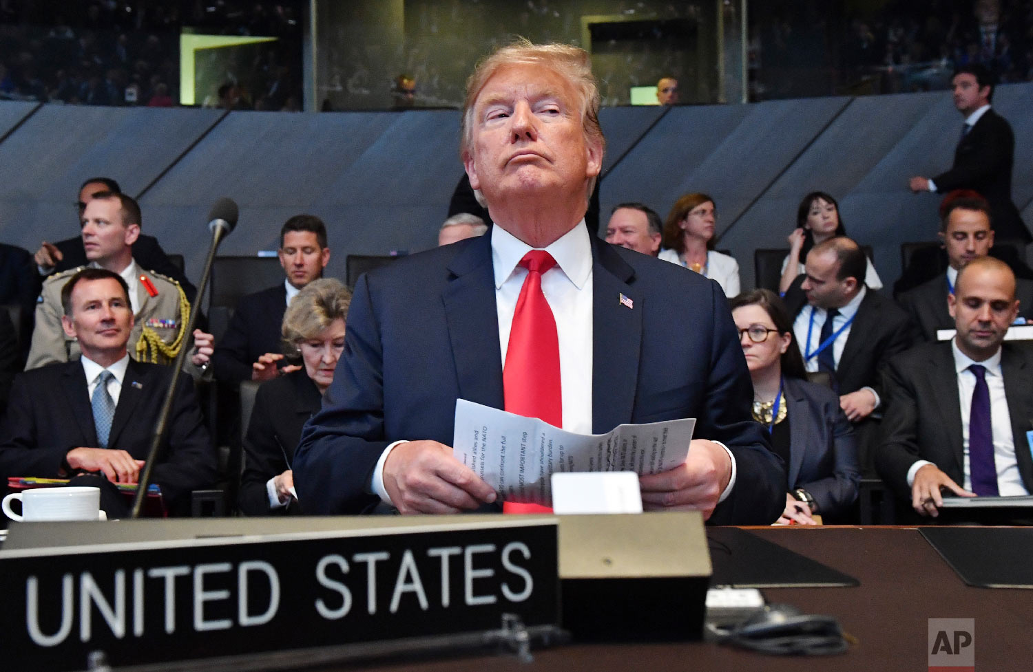  U.S. President Donald Trump attends a meeting of the North Atlantic Council during a summit of heads of state and government at NATO headquarters in Brussels on July 11, 2018. (AP Photo/Geert Vanden Wijngaert) 