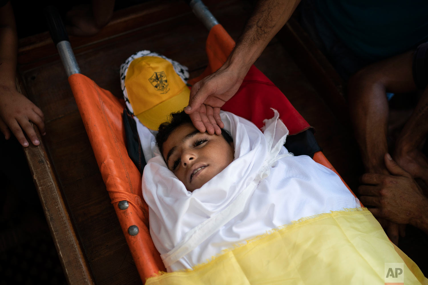 Palestinians mourn over the body of 11-year-old Shady Abdel-al during his funeral in Beit Lahiya, northern Gaza Strip Sept. 15, 2018. Though the Health Ministry initially reported Abdel-al was shot by Israeli fire, the Israeli army claimed he was ac