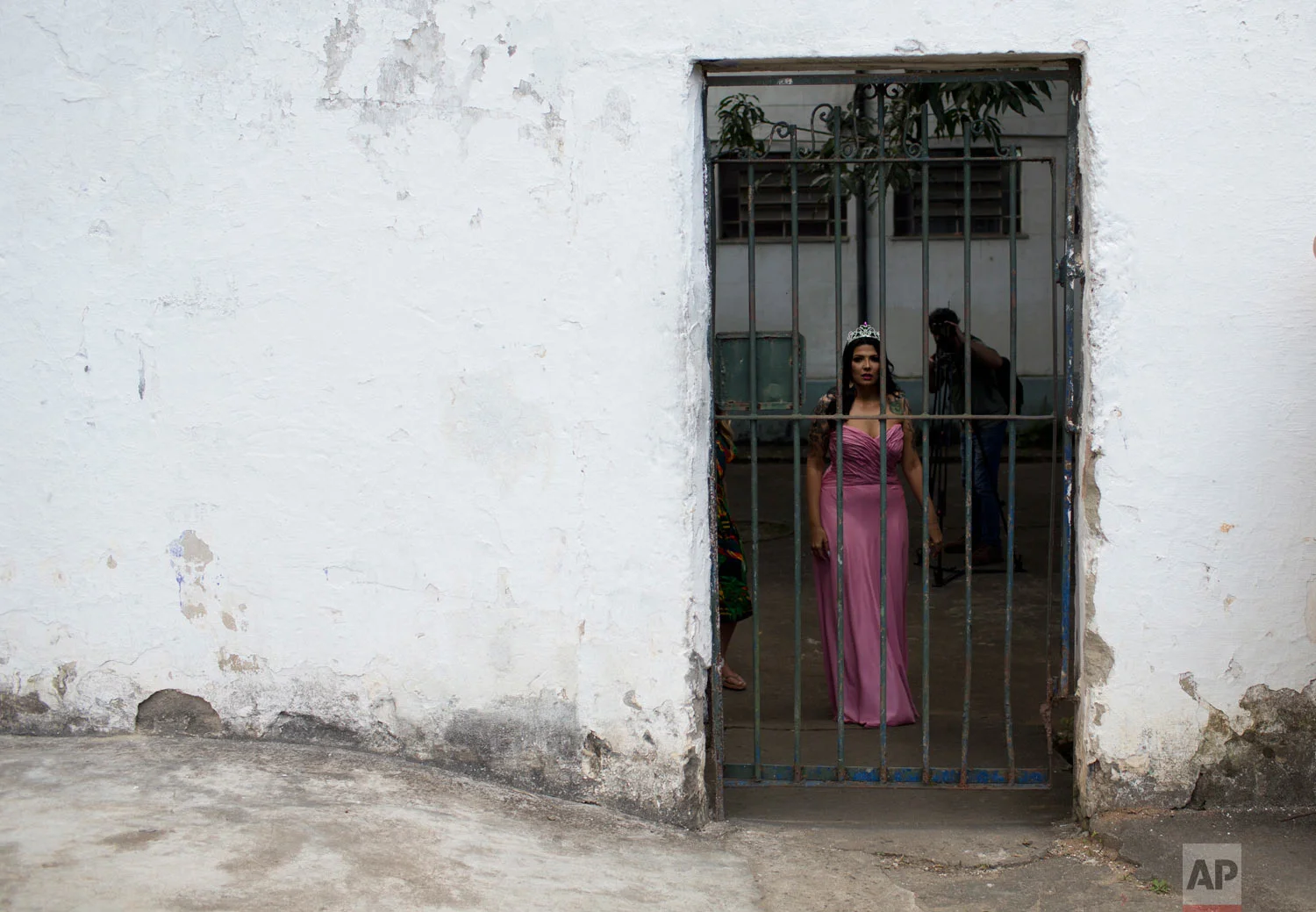 In this Dec. 4, 2018 photo, female prisoner Mayana Rosa Alves wears the crown she won at last year's beauty pageant, before this year's beauty contest at the Talavera Bruce penitentiary in Rio de Janeiro, Brazil. Jail authorities organize the contests to encourage self-esteem, fight idleness and promote integration among women prisoners. (AP Photo/Silvia Izquierdo)