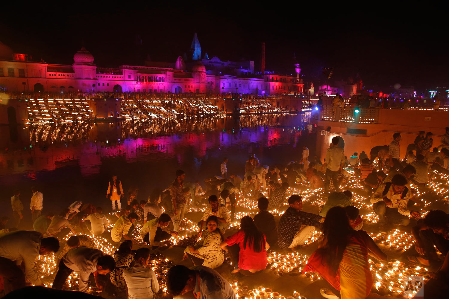  Devotees light earthen lamps on the banks of the River Sarayu as part of Diwali celebrations in Ayodhya, India, India, Tuesday, Nov. 6, 2018. The north Indian City of Ayodhya made an attempt to break the Guinness Book of World record when several ea