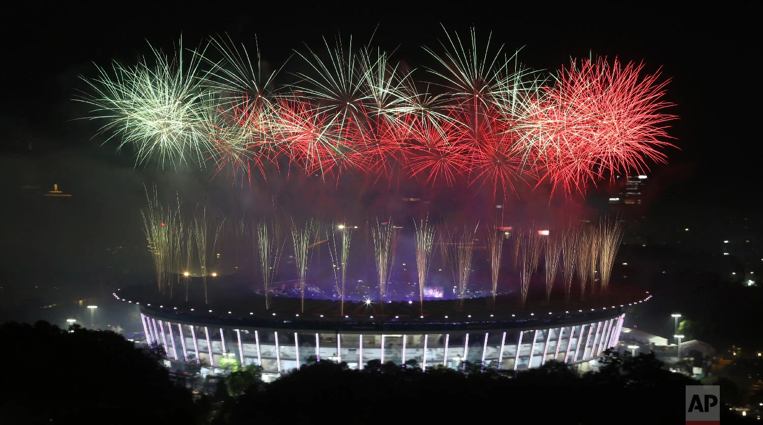 Fireworks explode over the Gelora Bung Karno Stadium during the closing ceremony for the 18th Asian Games at in Jakarta, Indonesia, Sunday, Sept. 2, 2018. (AP Photo/Achmad Ibrahim)