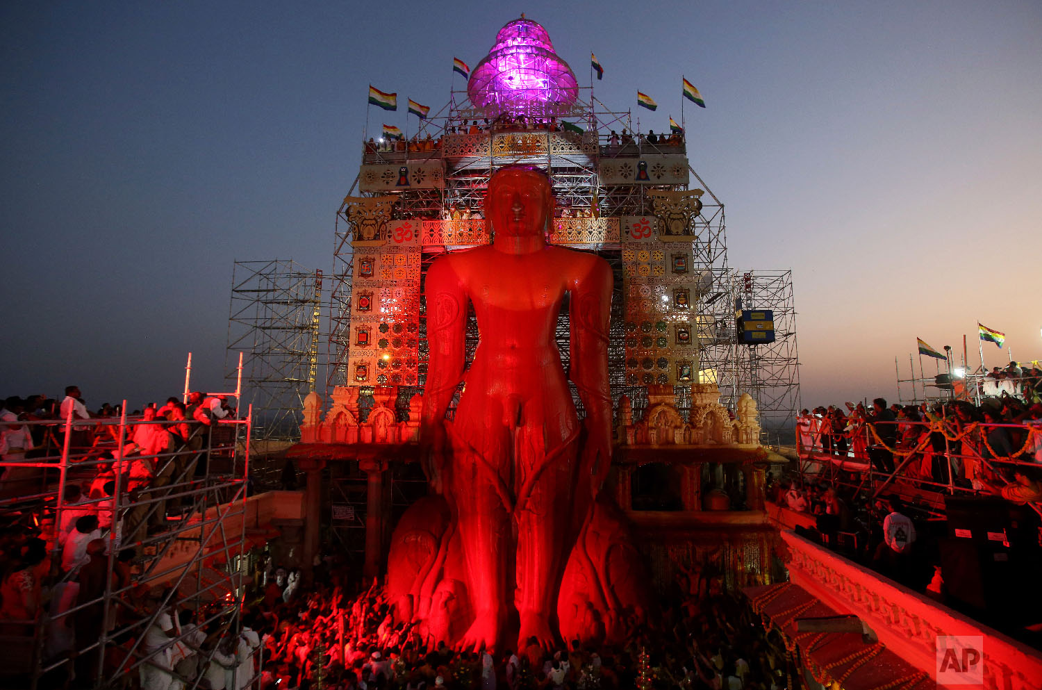  Vermilion runs down the 58.8-foot monolithic statue of Jain god Gomateshwara at Shravanabelagola 145 kilometers (91 miles) west of Bangalore, India, Saturday, Feb. 17, 2018. Hundreds of thousands of Jain devotees will attend the Mahamastabhisheka or