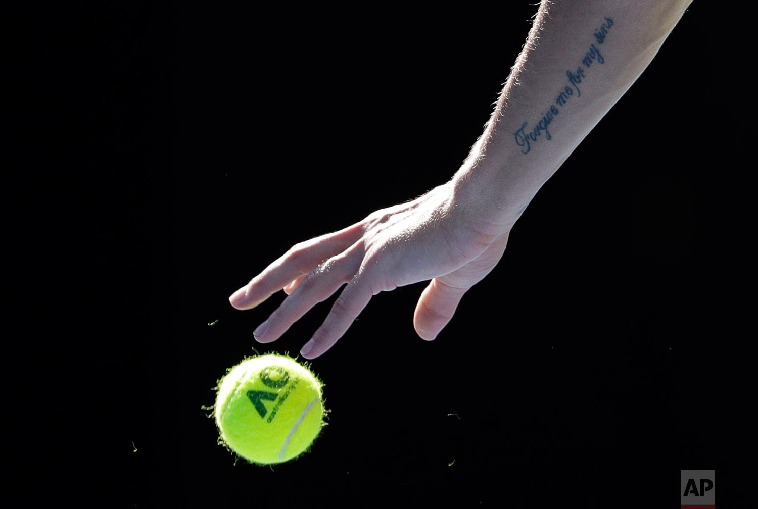  Hungary's Marton Fucsovics prepares to serve to Switzerland's Roger Federer during their fourth round match at the Australian Open tennis championships in Melbourne, Australia, Monday, Jan. 22, 2018. (AP Photo/Dita Alangkara) 