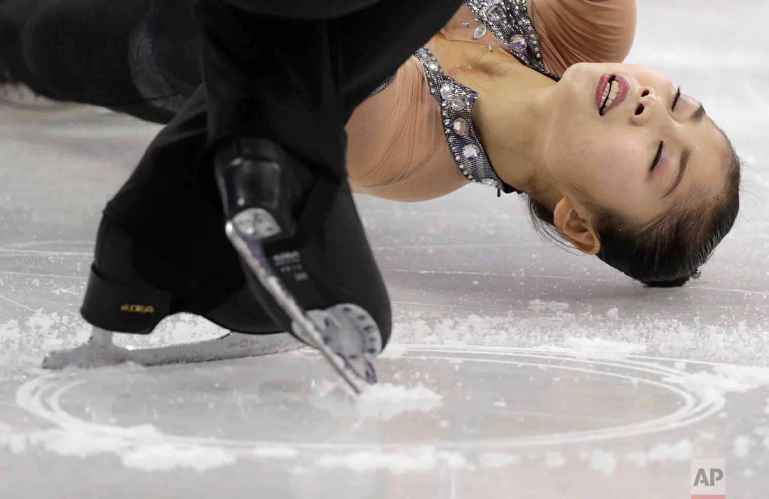 Ryom Tae Ok and Kim Ju Sik of North Korea perform in the pair figure skating short program in the Gangneung Ice Arena at the 2018 Winter Olympics in Gangneung, South Korea, Wednesday, Feb. 14, 2018. (AP Photo/David J. Phillip)