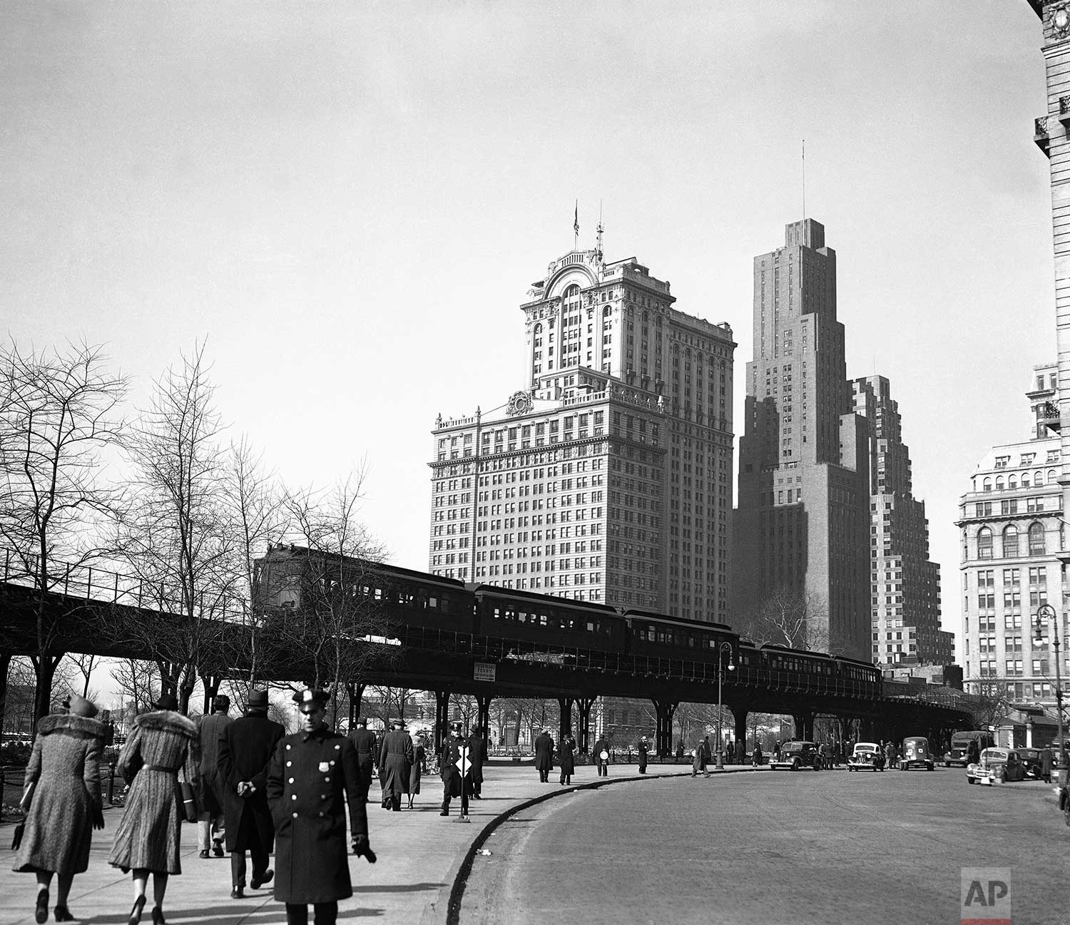  The Ninth Avenue "El" or elevated, is shown looking north along State Street in New York, Feb. 22, 1940. The transit commission has authorized the condemnation of the structure. (AP Photo) 