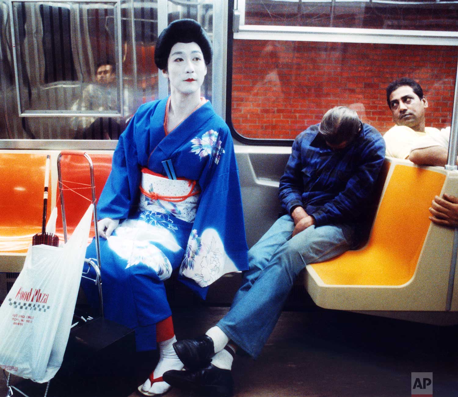  Japanese artist Hiroshi Soga rides a subway on his way to a performance in New York on June 14, 1989. Soga, in New York from Tokyo to exhibit his paintings and other creations, also performs interpretive dance based on ancient themes dressed in a tr
