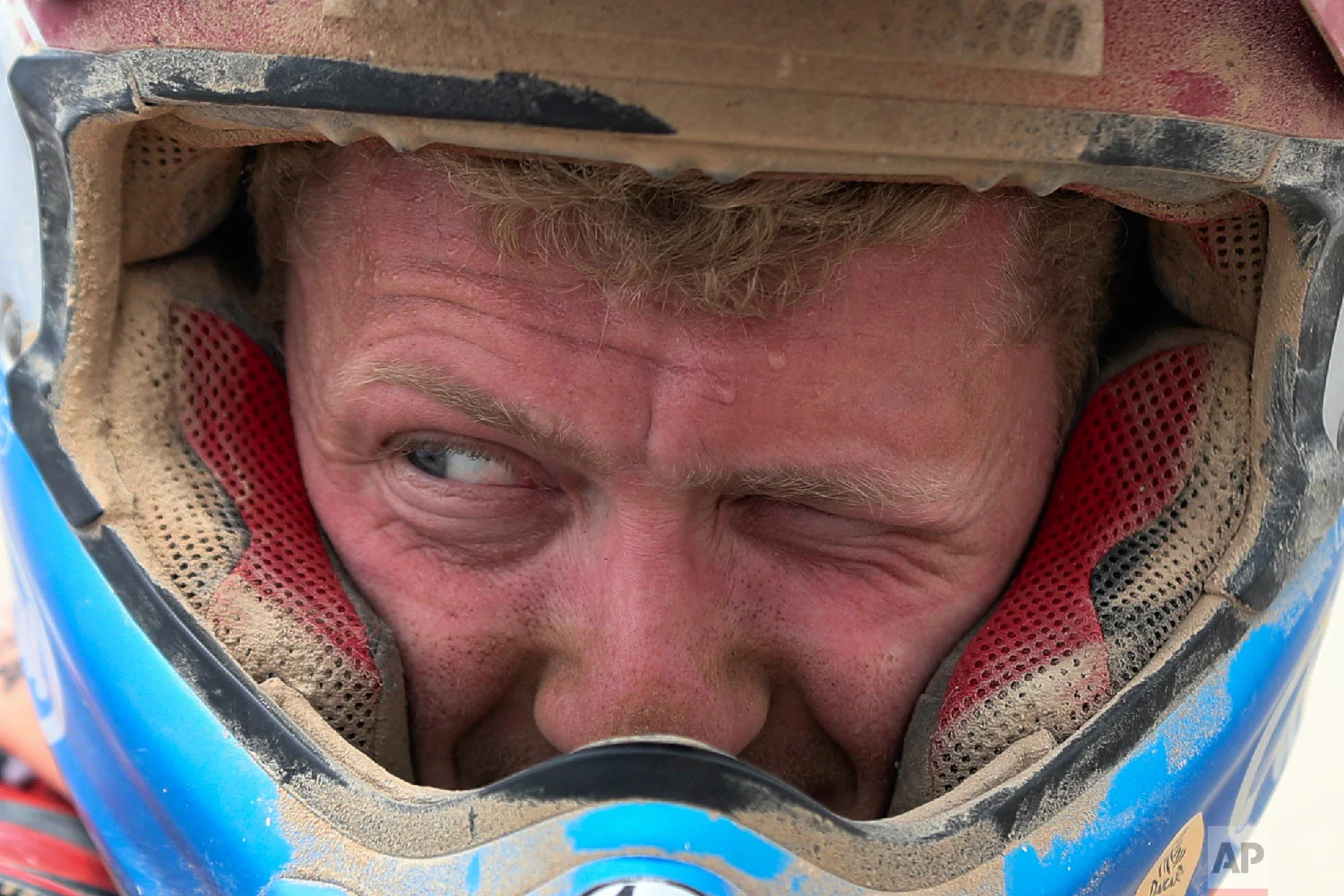 KTM motorbike rider Mark Tielemans stops to refuel in Peru, Jan. 15, 2019. (AP Photo/Ricardo Mazalan)