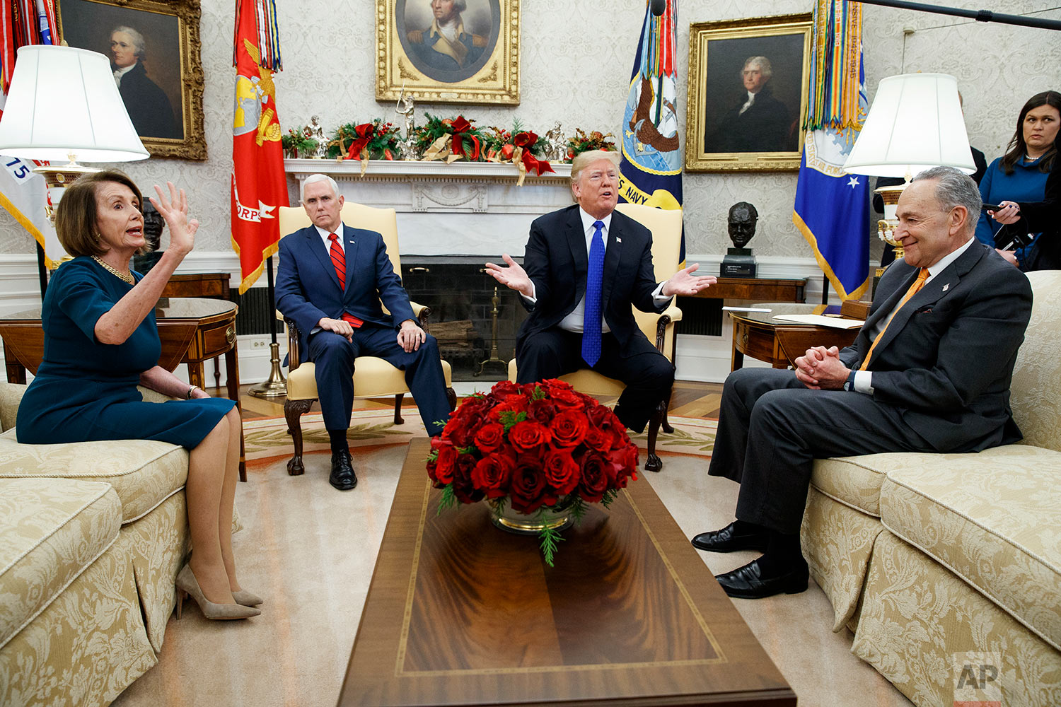  President Donald Trump and Vice President Mike Pence meet with Senate Minority Leader Chuck Schumer, D-N.Y., and House Minority Leader Nancy Pelosi, D-Calif., in the Oval Office of the White House, Tuesday, Dec. 11, 2018, in Washington. (AP Photo/Ev