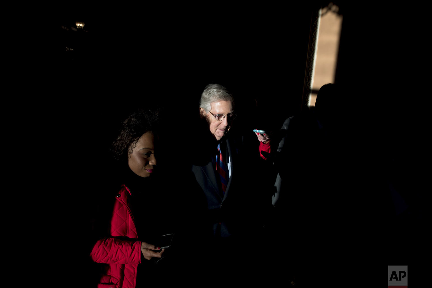  Senate Majority Leader Mitch McConnell, R-Ky., walks out of the Senate Chamber after passing a continuing resolution to reopen the government, on Capitol Hill in Washington, on Friday, Jan. 25, 2019. (AP Photo/Andrew Harnik) 