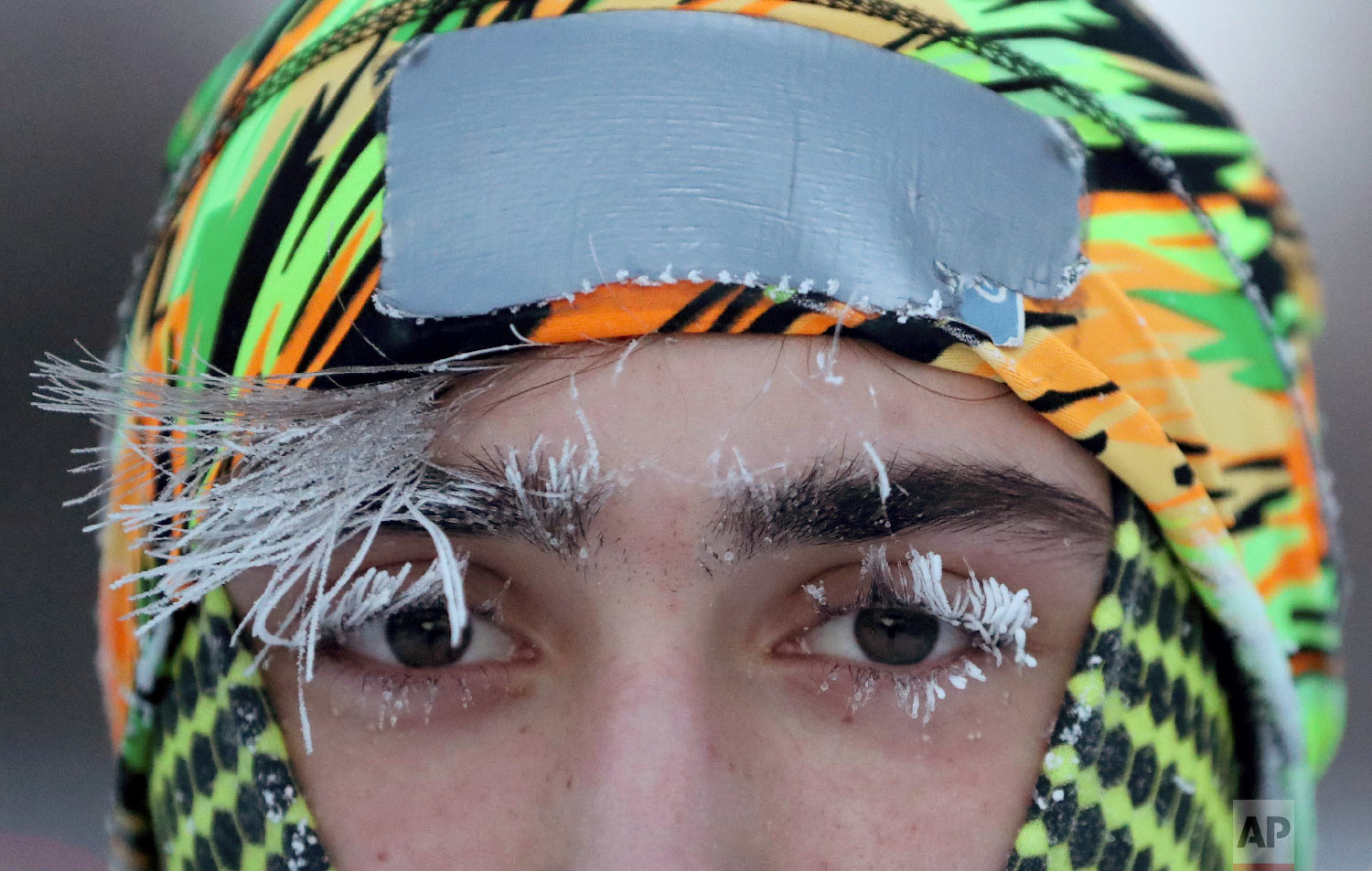  Frost covers part of the face of University of Minnesota student Daniel Dylla during a morning jog along Mississippi River Parkway Tuesday, Jan. 29, 2019, in Minneapolis. (David Joles/Star Tribune via AP) 