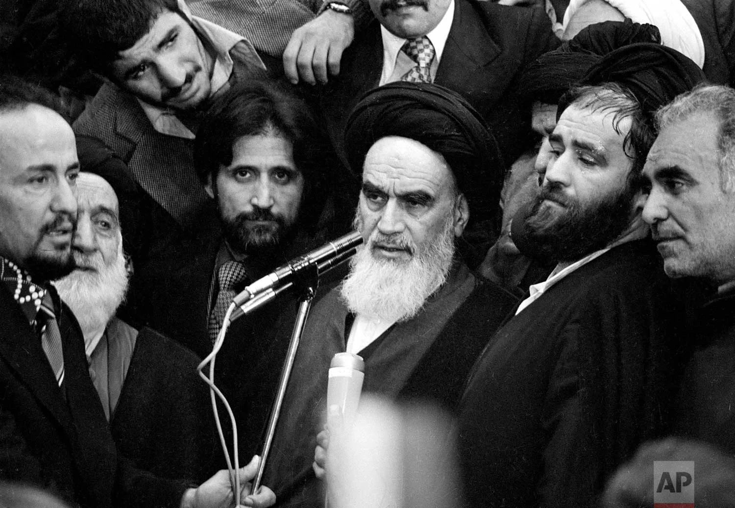 Ayatollah Khomeini addresses an audience in the airport building in Tehran, Iran, Feb. 1, 1979, after his arrival from 14 years of exile. (AP Photo)