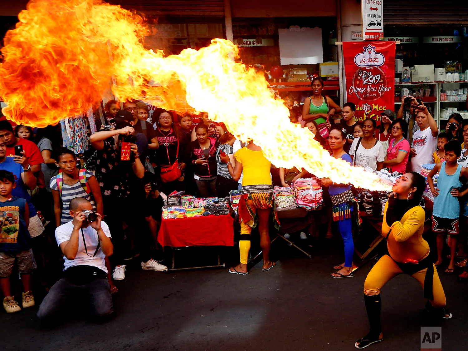 Fire-eater performs during celebrations of the Lunar New Year in the Chinatown district of Manila, Philippines, Tuesday, Feb. 5, 2019. (AP Photo/Bullit Marquez)