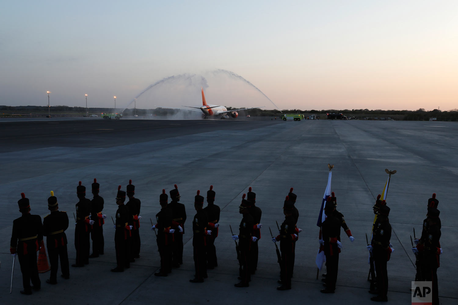  Pope Francis is given a water salute as his plane departs Tocumen Airport after a five-day visit in Panama City, Jan. 27, 2019. (AP Photo/Rebecca Blackwell) 