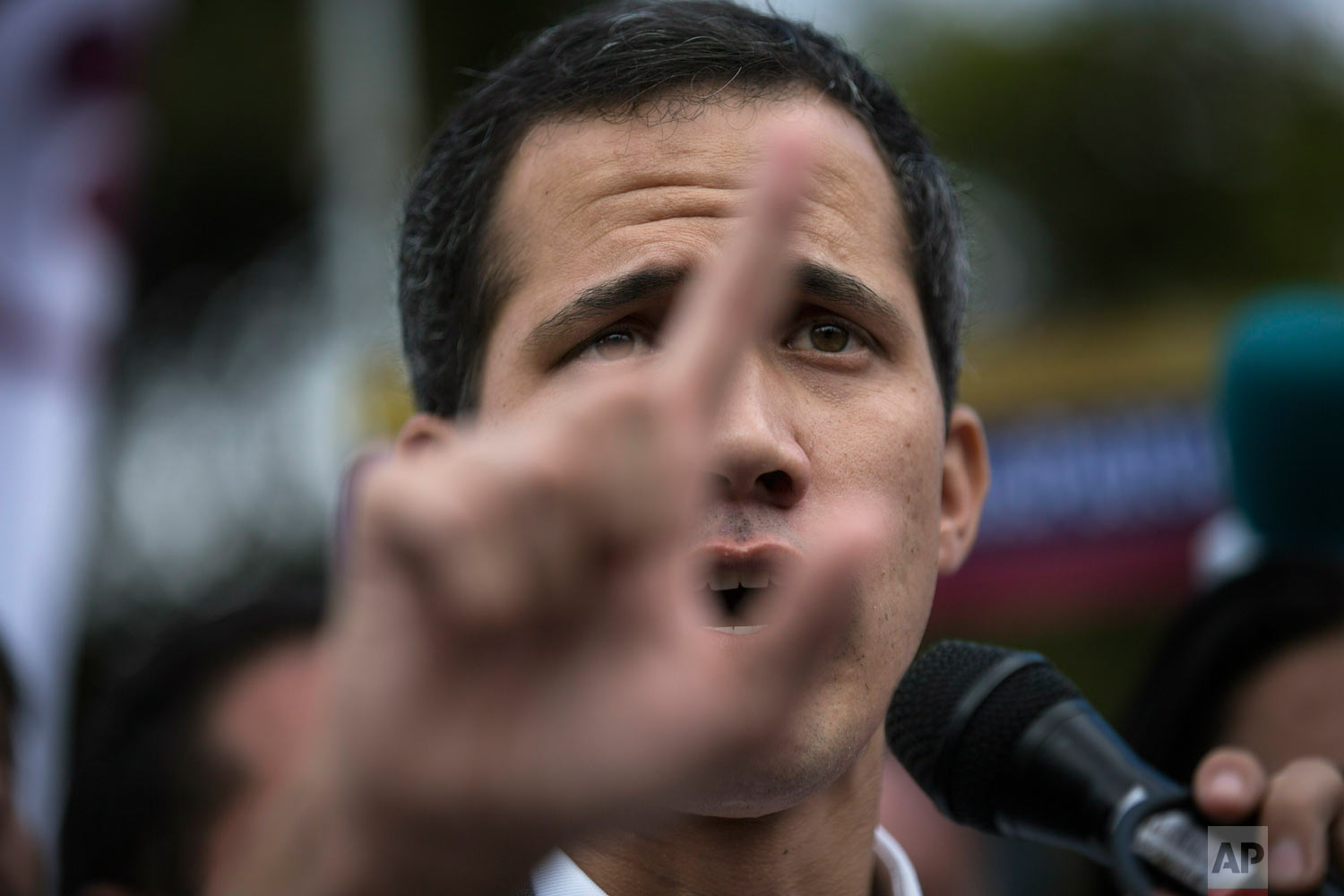  Venezuela's self-declared interim President, Juan Guaido, speaks to anti-government protesters in Caracas, Venezuela, Jan. 26, 2019.  (AP Photo/Rodrigo Abd) 