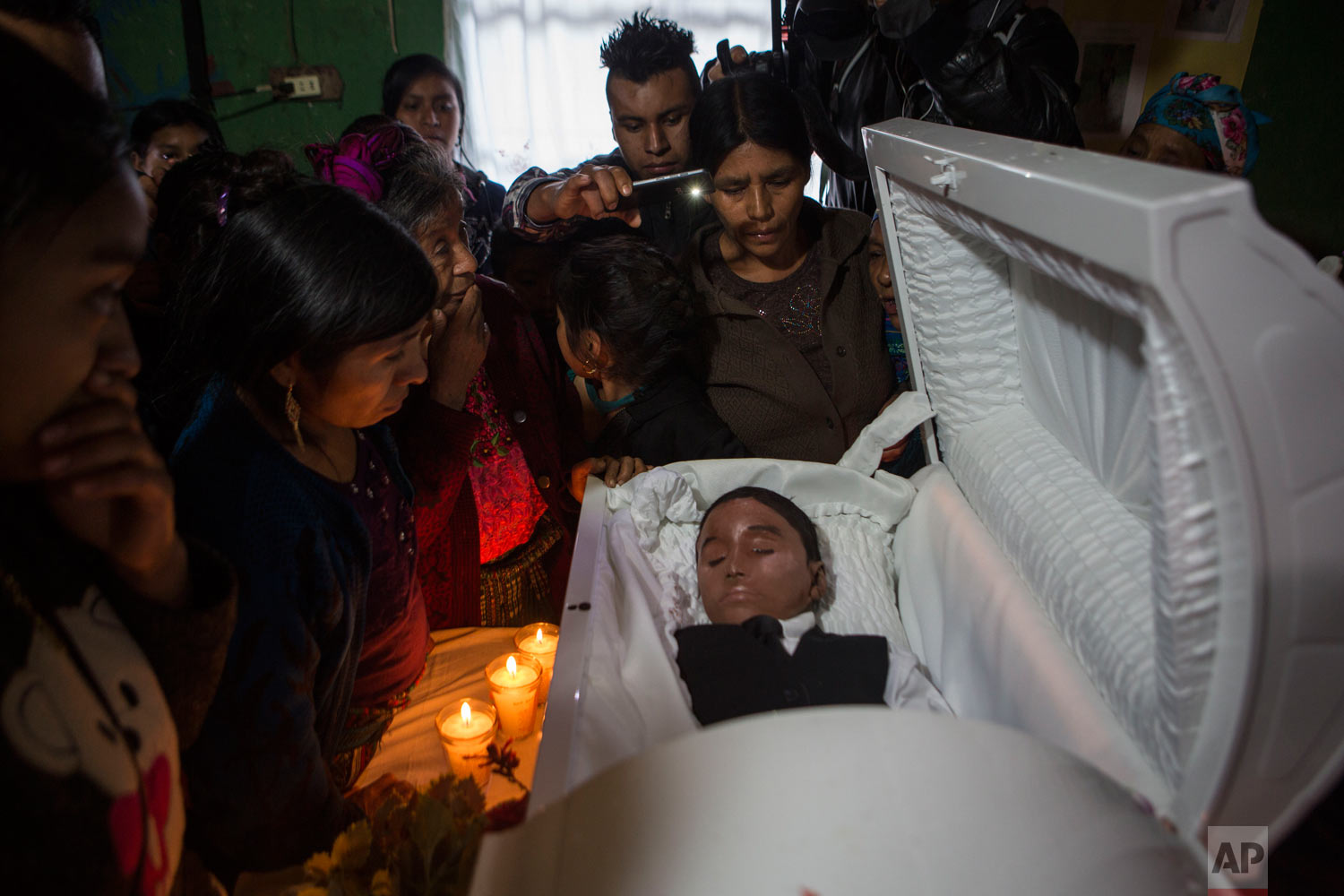  Family members pay their last respects to Felipe Gomez Alonzo, an 8-year-old migrant boy who died in U.S. custody at a New Mexico hospital on Christmas Eve, in Yalambojoch, Guatemala, Jan. 26, 2019. Felipe and his father were apprehended by the U.S.