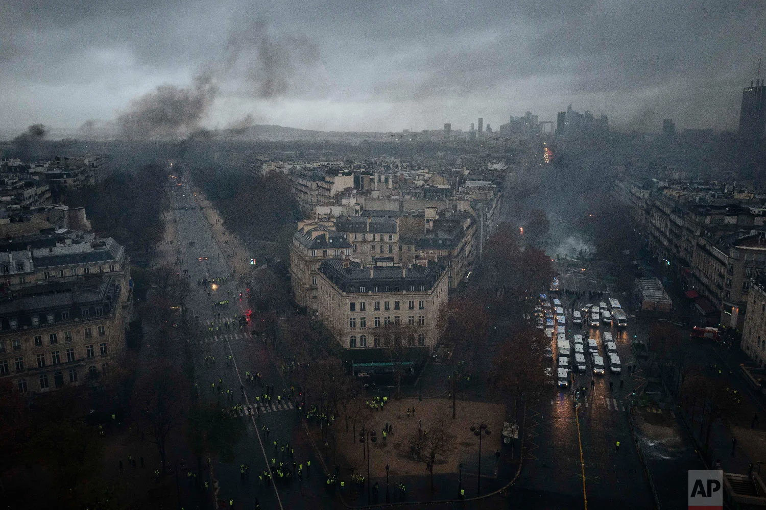 Avenues leading to the Arc de Triomphe are pictured from the top of the Arc de Triomphe on the Champs-Elysees avenue during a demonstration, Dec. 1, 2018 in Paris. (AP Photo/Kamil Zihnioglu)