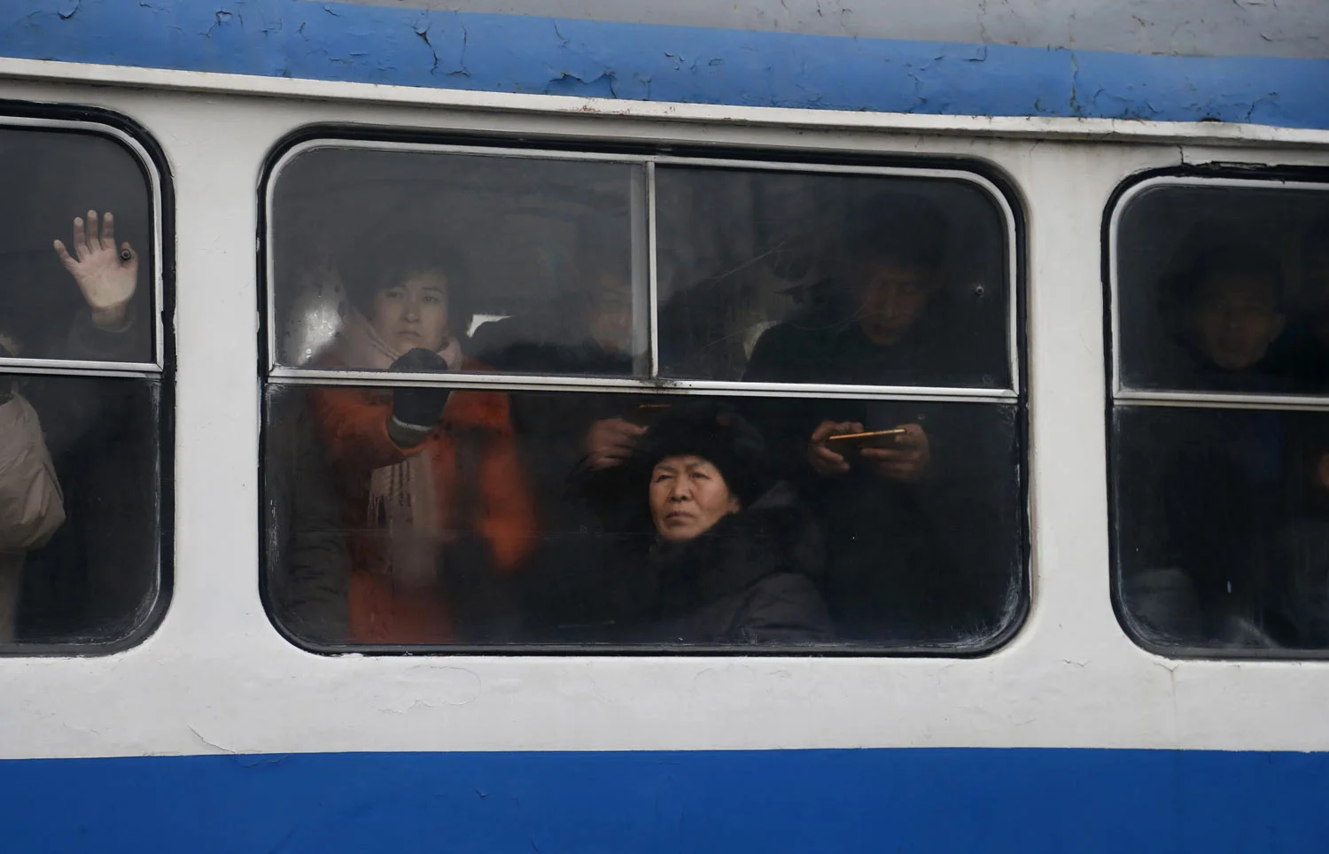 Passengers ride on a crowded tram in downtown Pyongyang, North Korea, Sunday, Feb. 3, 2019. (AP Photo/Dita Alangkara)