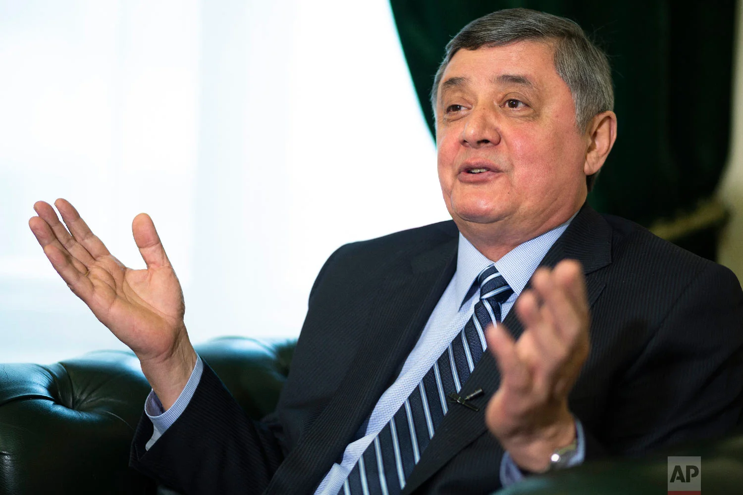 Russian presidential envoy to Afghanistan Zamir Kabulov speaks during an interview with The Associated Press in Moscow, Russia on Feb. 13, 2019. (AP Photo/Alexander Zemlianichenko)