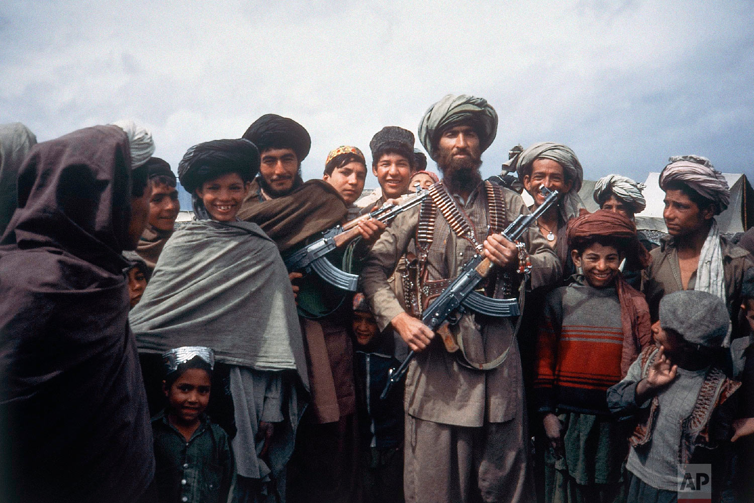Mujahedeen tribesmen stand at a border camp near Wana in Afghanistan. (AP Photo/Christopher Gunness)