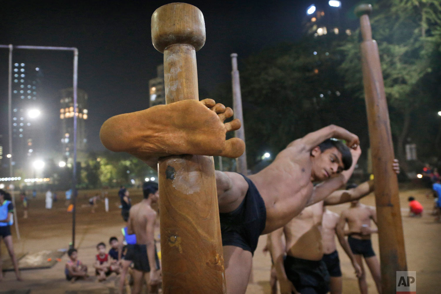 A mallakhamb player trains early morning at the Shree Samartha Vyayam Mandir on Feb 4, 2019, in Mumbai, India. (AP Photo/Rafiq Maqbool)