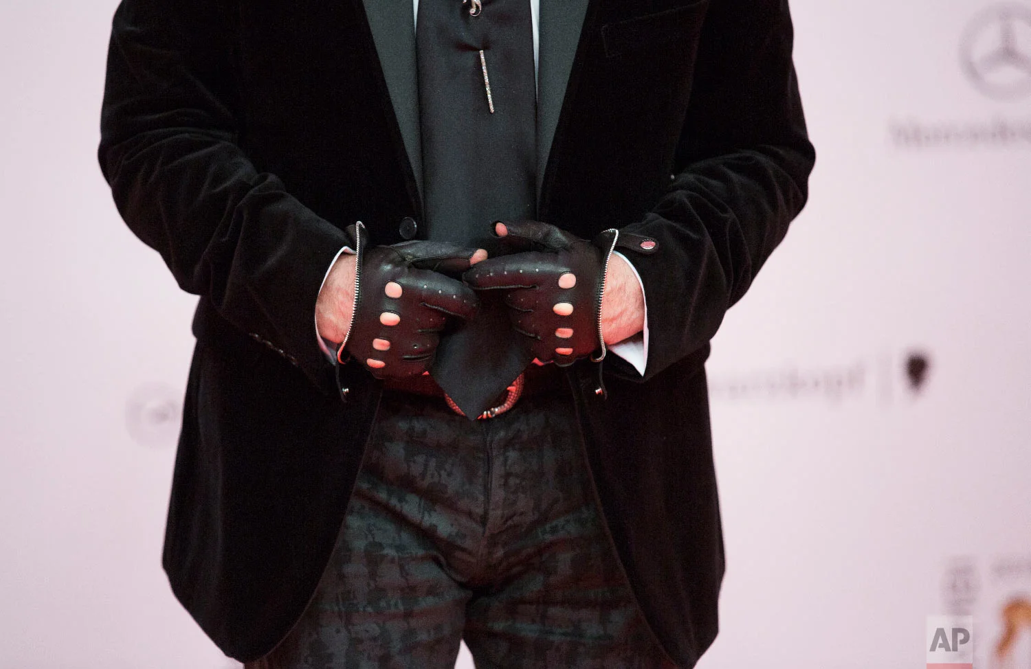 Karl Lagerfeld arrives for the Bambi 2013 media awards in Berlin, Germany, Nov. 14, 2013. (AP Photo/Gero Breloer)