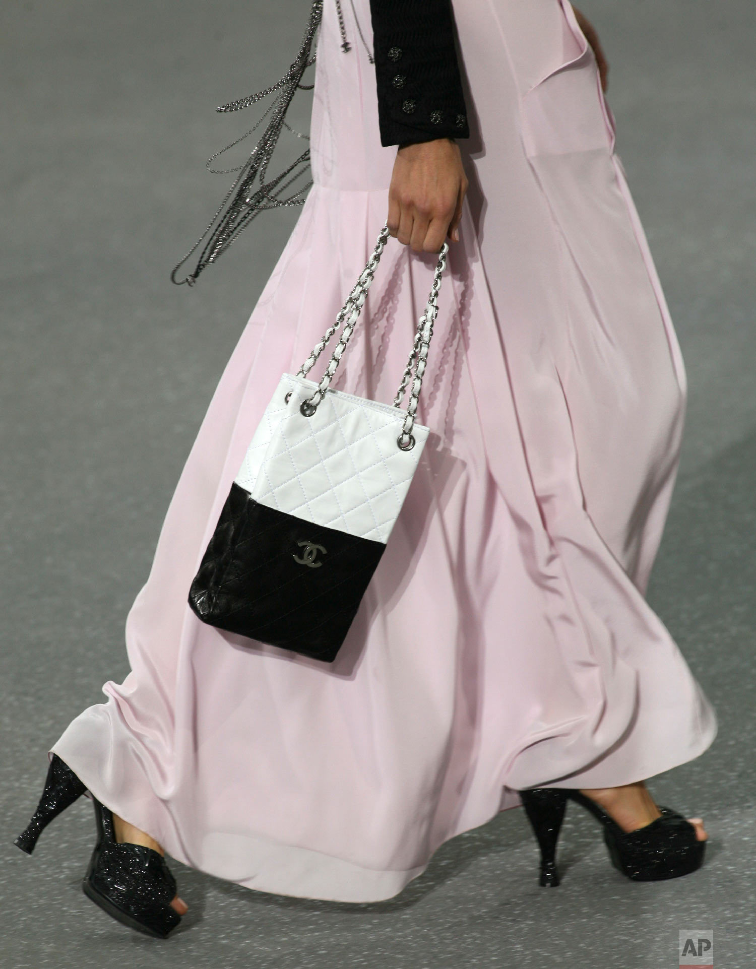 A model presents a creation by Lagerfeld in Paris, Oct. 3, 2008. (AP Photo/Jacques Brinon)