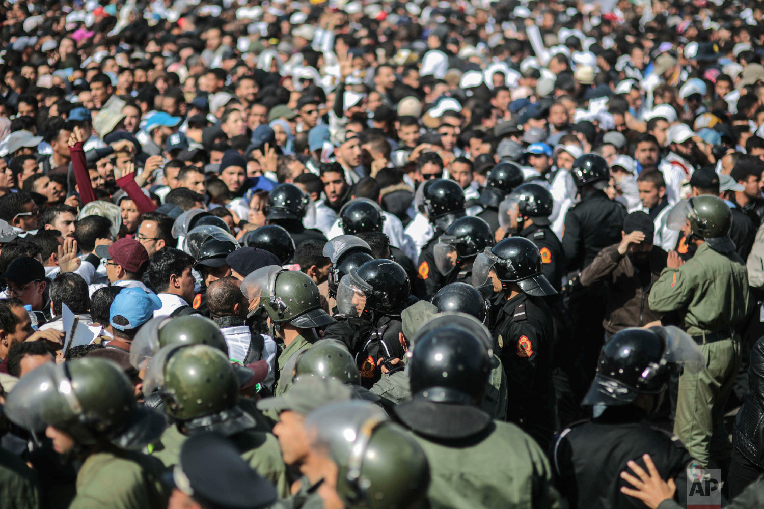 Security forces stand guard as they attempt to disperse a protest by teachers in Rabat, Morocco, Feb. 20, 2019. (AP Photo/Mosa'ab Elshamy)