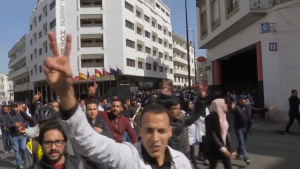 Protesters march during a demonstration in Rabat, Morocco, Feb. 20, 2019. (AP Video/Nadine Achoui-Lesage)