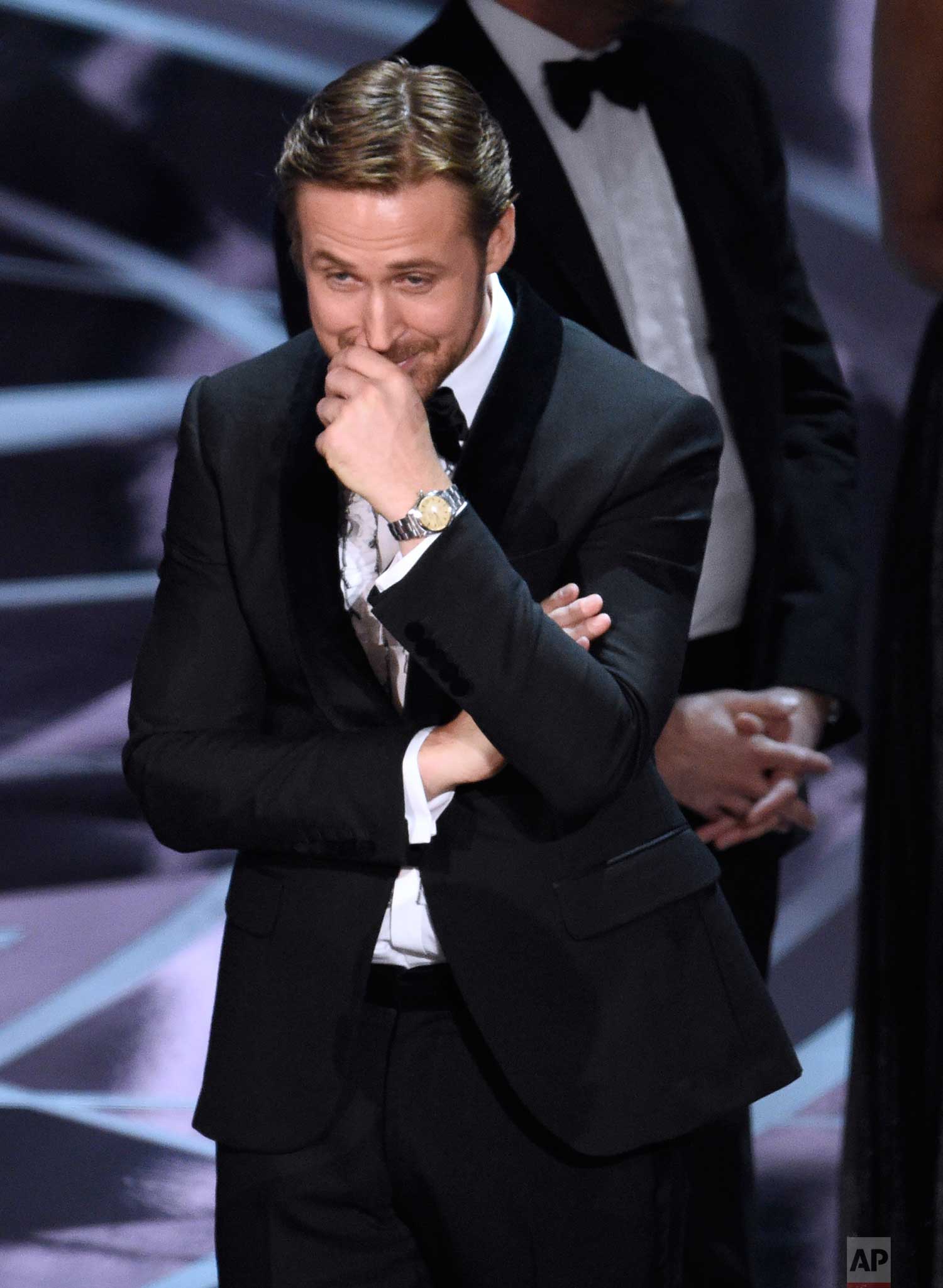  Ryan Gosling reacts as the true winner of best picture is announced at the Oscars on Sunday, Feb. 26, 2017, at the Dolby Theatre in Los Angeles. It was originally announced that "La La Land" won, but the winner was actually, "Moonlight." (Photo by C