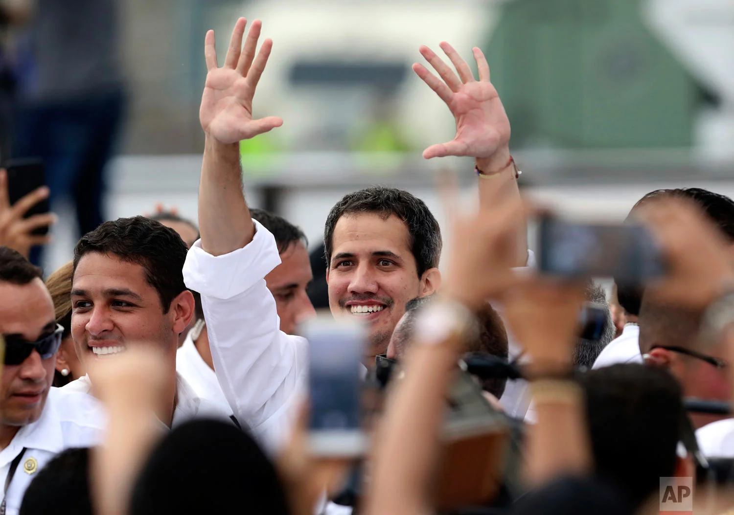 Venezuela's self-proclaimed interim president Juan Guaido arrives at the Venezuela Aid Live concert on the Colombian side of the Tienditas International Bridge near Cucuta, Colombia, on the border with Venezuela, Friday, Feb. 22, 2019. (AP Photo/Fernando Vergara)