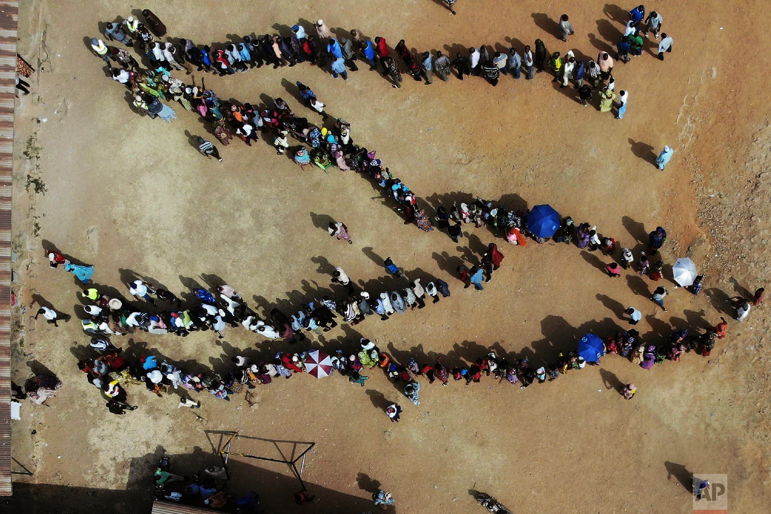 Nigerians line up to vote at the Narayi primary school in Kaduna, Nigeria, Feb. 23, 2019. (AP Photo/Jerome Delay)