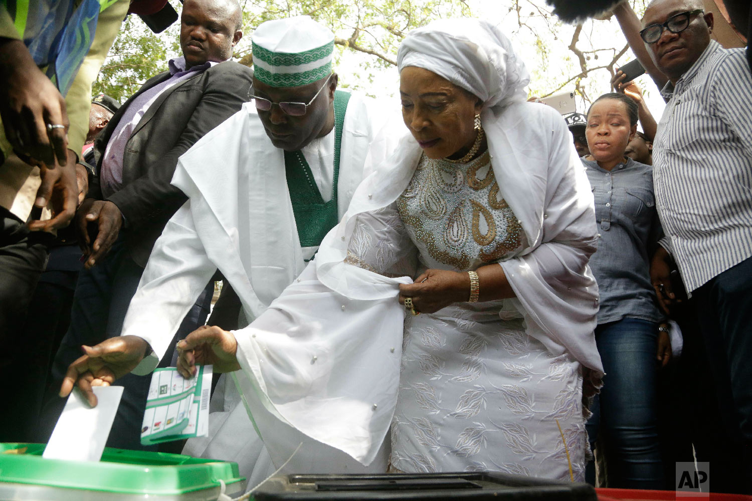 Opposition's presidential candidate Atiku Abubakar, left, and his wife Titi Abubakar, right, cast their votes in Yola Nigeria, Feb. 23, 2019. (AP Photo/Sunday Alamba)