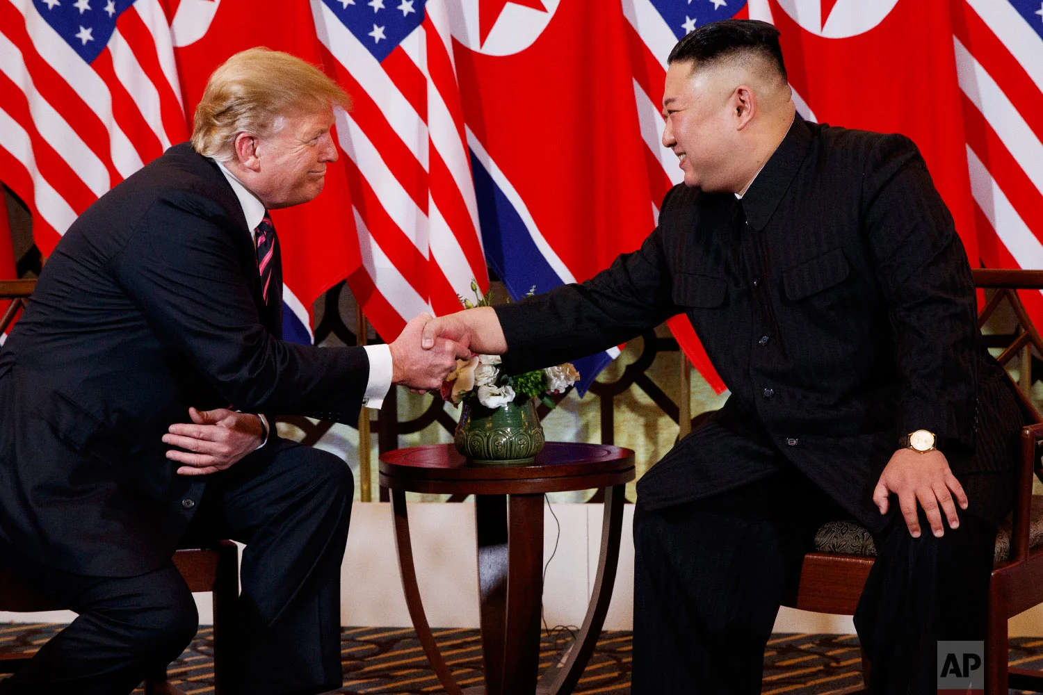 U.S. President Donald Trump shakes hands with North Korean leader Kim Jong Un, Wednesday, Feb. 27, 2019, in Hanoi. (AP Photo/ Evan Vucci)