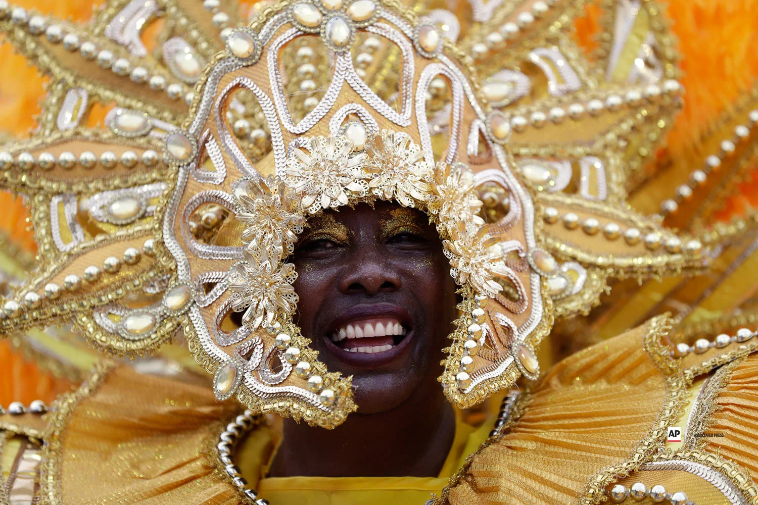 A dancer from the Tom Maior samba school performs during a carnival parade in Sao Paulo, Brazil, Saturday, March 2, 2019. (AP Photo/Andre Penner)