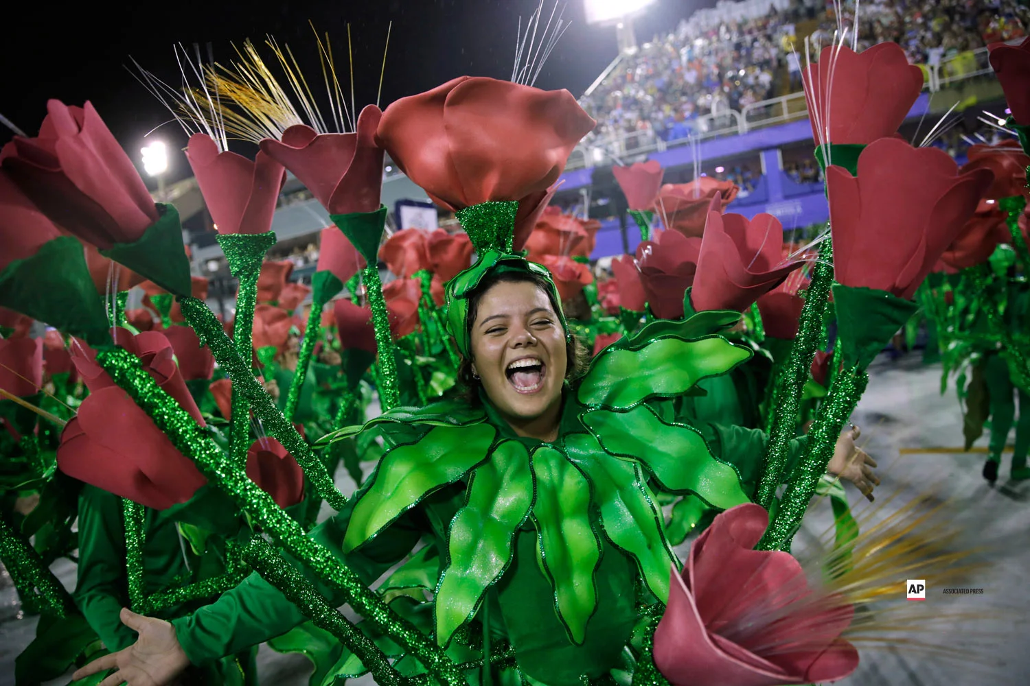 A performer from the Imperio Serrano samba school parades during Carnival celebrations at the sambadrome in Rio de Janeiro, Brazil, Sunday, March 3, 2019. (AP Photo/Silvia Izquierdo)