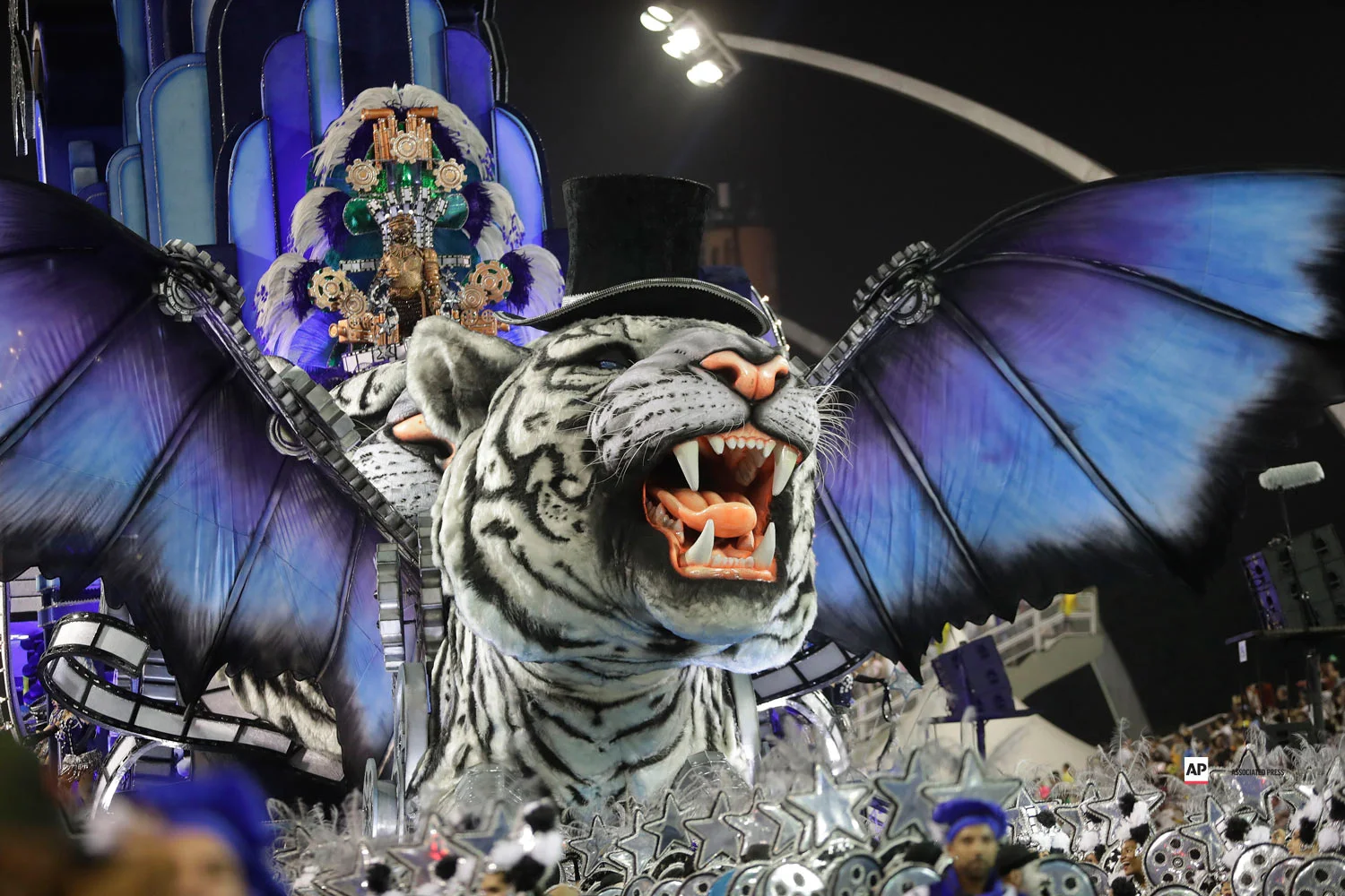 Dancers from the Imperio de Casa Verde samba school perform on a float during a carnival parade in Sao Paulo, Brazil, Saturday, March 2, 2019. (AP Photo/Andre Penner)