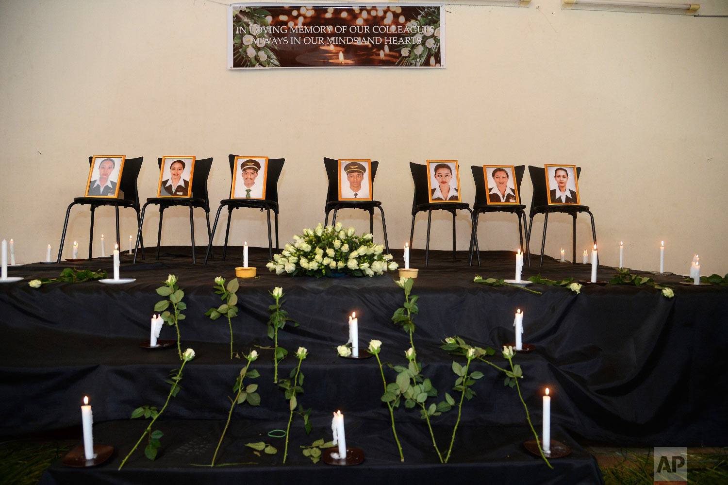 Framed photographs of seven crew members killed were on display, in Addis Ababa, Ethiopia Monday, March 11, 2019. (AP Photo/Samuel Habtab)