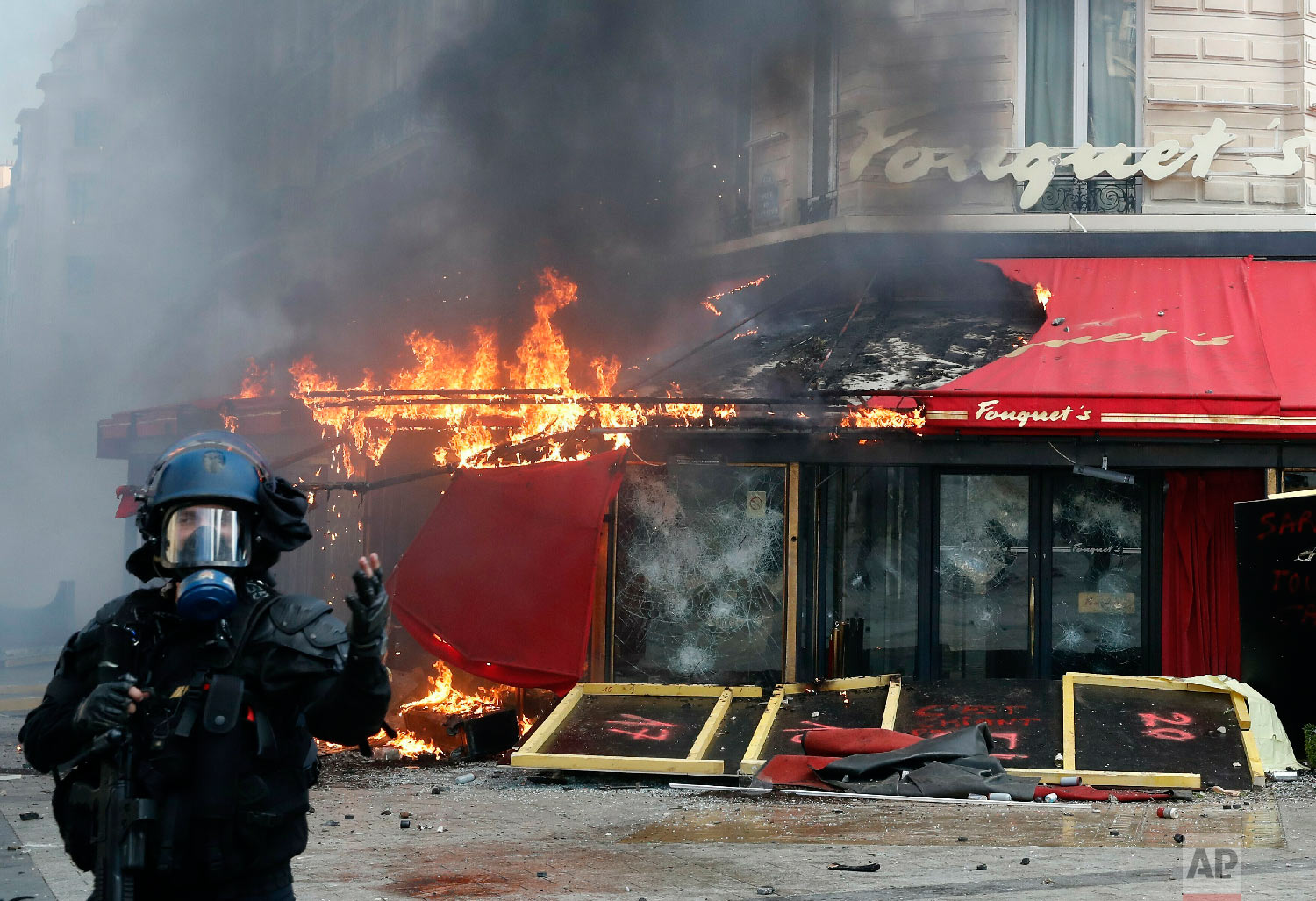 Paris protests: Scenes of destruction on Champs Elysées, Gallery