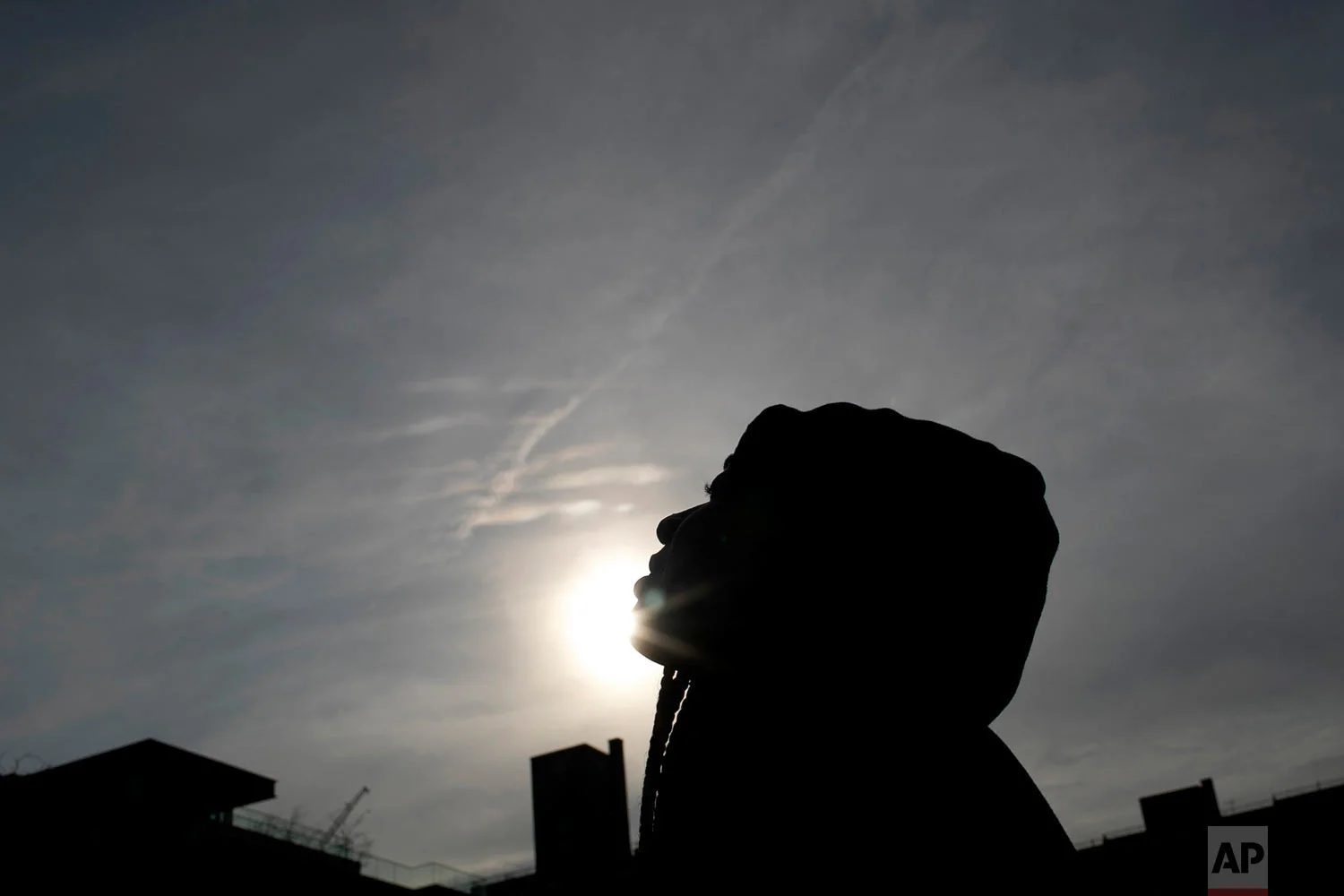 A survivor of sexual assault meditates in the Brooklyn borough of New York on Thursday, March 14, 2019. “Most people will say, ‘What were you wearing or what were you doing? Why were you out so late?’" the young woman said. She found refuge in two trusted teachers, who sent her to “Sisters in Strength,” run by the nonprofit Girls for Gender Equity. (AP Photo/Wong Maye-E)