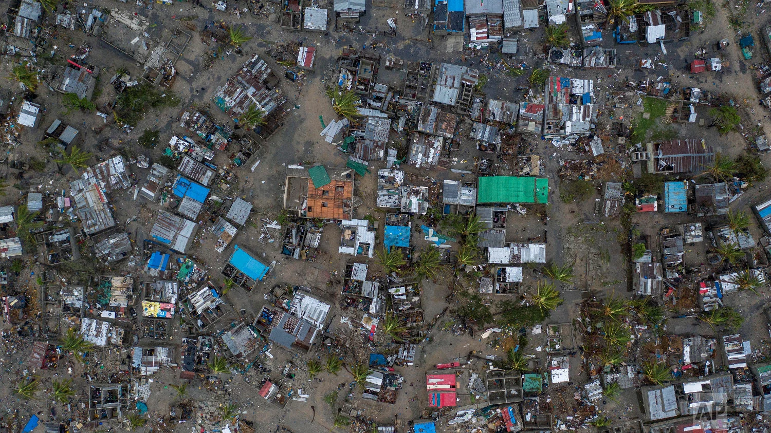 Seen from a drone Praia Nova Village, one of the most affected neighborhoods in Beira, razed by the passing cyclone, in the coastal city of Beira, Mozambique, Sunday March 17, 2019. (Josh Estey/CARE via AP)