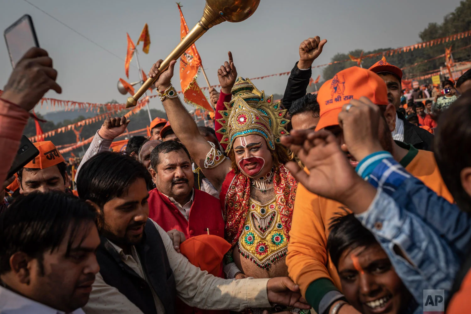 A supporter of the Hindu nationalist political group Vishwa Hindu Parishad is dressed as the Hindu deity Hanuman during a rally in New Delhi, India, Dec. 9, 2018. (AP Photo/Bernat Armangue)