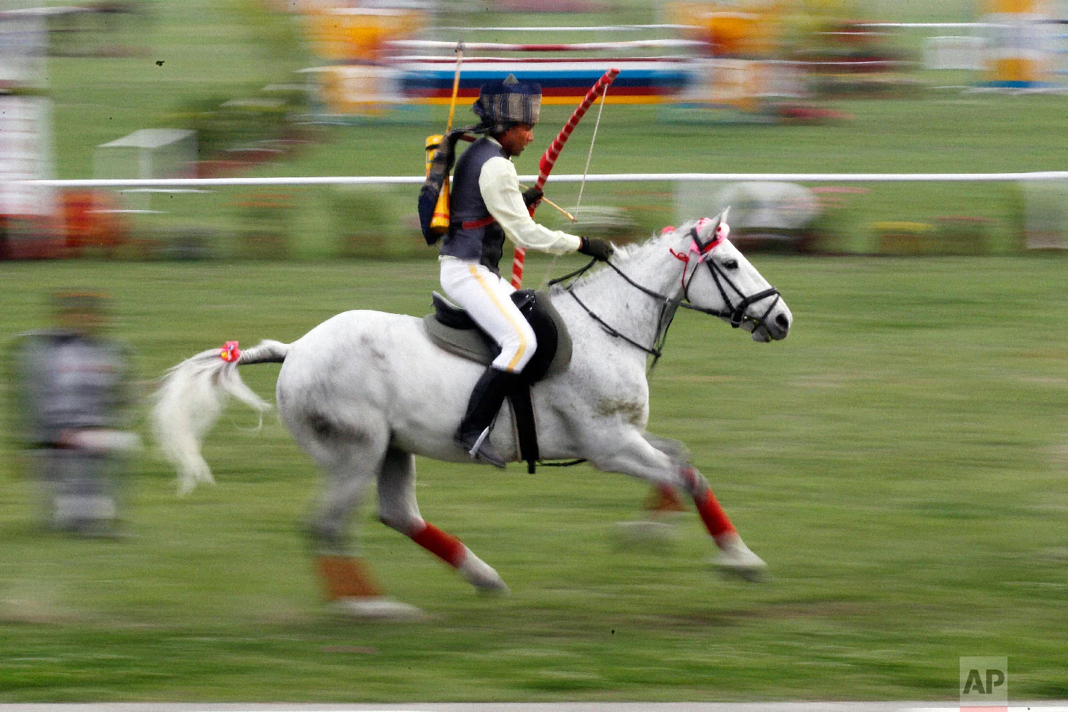 A Nepalese Cavalry soldier displays his skills during the Ghode Jatra festival on April 5, 2019, in Kathmandu, Nepal. (AP Photo/Niranjan Shrestha)