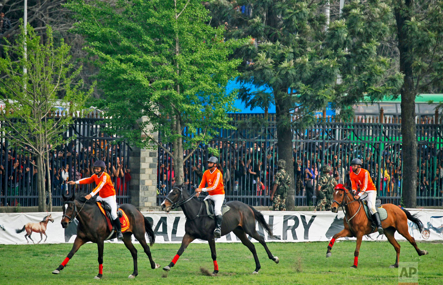 Nepalese gather to watch cavalry soldiers display their skills during the Ghode Jatra festival in April 5, 2019, Kathmandu, Nepal. (AP Photo/Niranjan Shrestha)