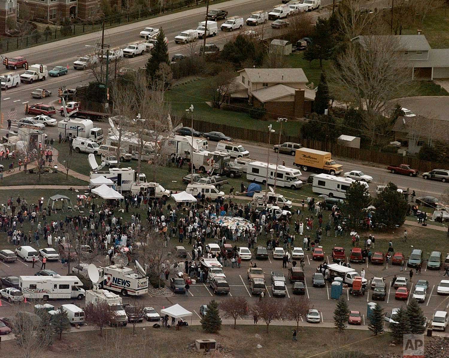  This aerial shows the news media compound near Columbine High School in Littleton, Colo., Wednesday, April 21, 1999. Media from around the world poured into the area after 15 people were killed during a shooting spree inside the school. (AP Photo/Ed